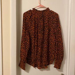 Animal print mock neck blouse